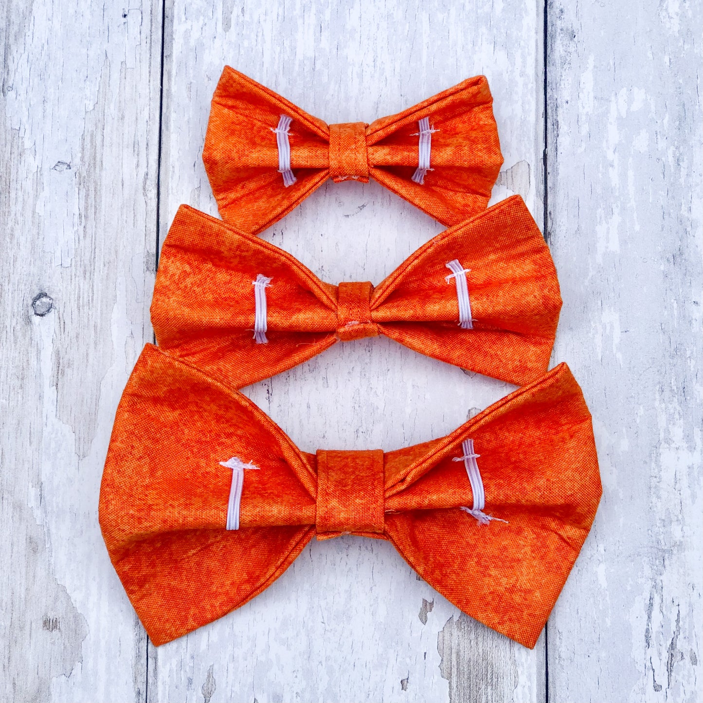 HETTY AND HUXLEY ORANGE FIR BOW TIES